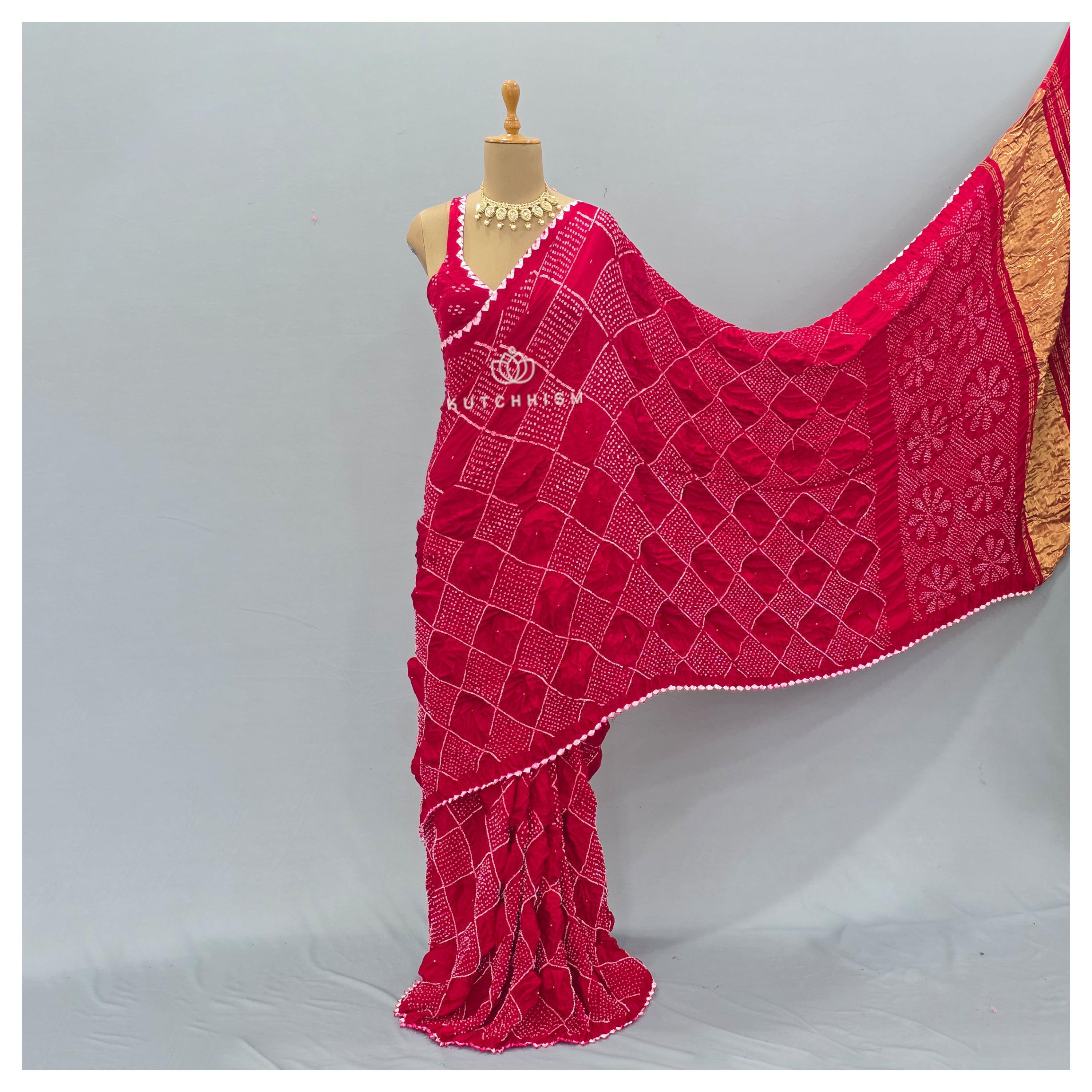 Red bandhani saree
