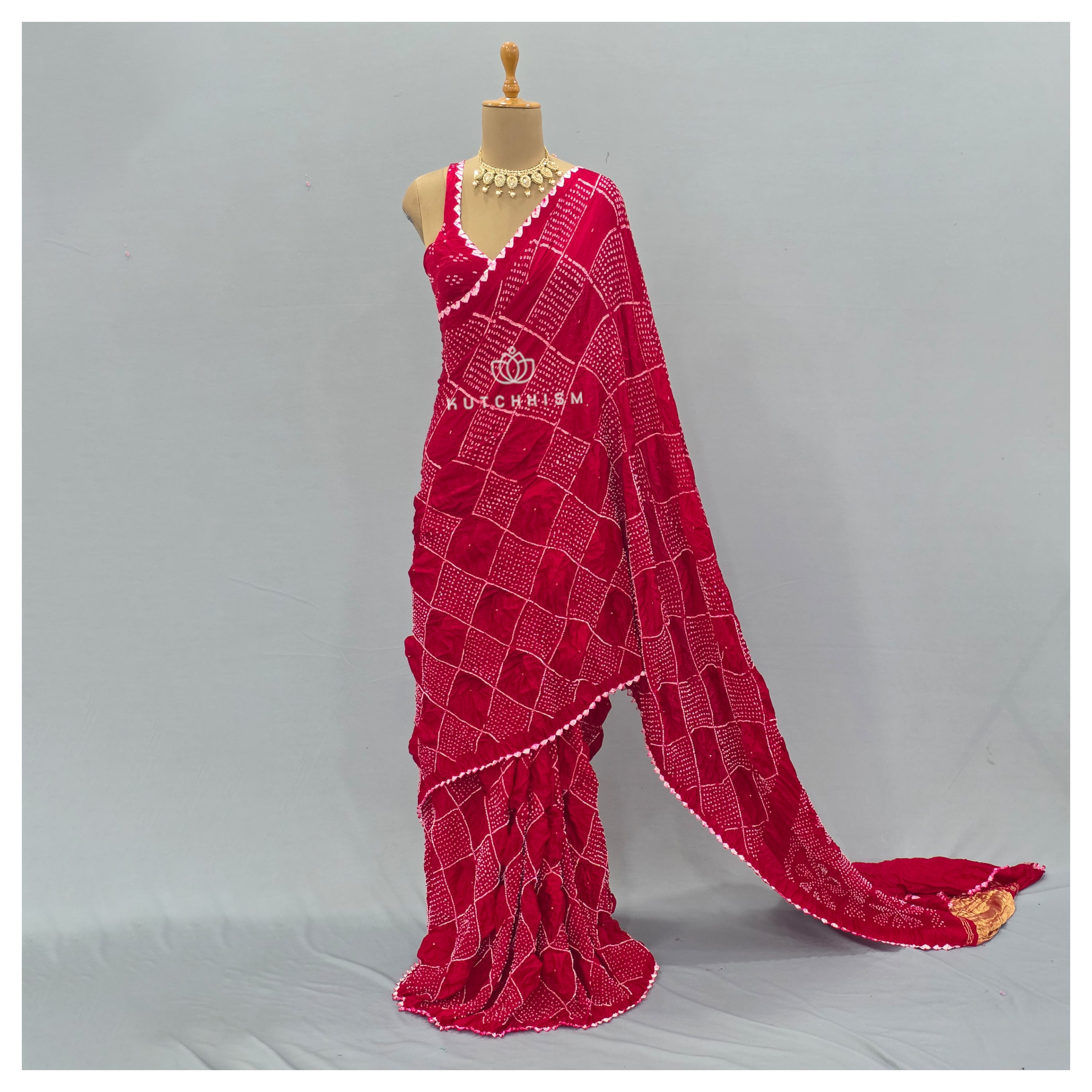 Red bandhani saree